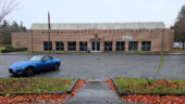 <em>Multnomah Branch</em> - I was waiting for a car parked near the door to leave, but after 5 minutes I got out of the car and took a photo anyway. As soon as I got back in the Miata, the car left, so hopped back out and scored the clean shot. (11/24/24)