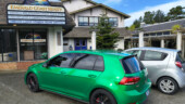 <em>Gleneden Beach</em> - See those two blue doors above the roof of the GTI? That is the entrance to the post office and there is a sign saying so but it is in the shadow. (3/1/26)