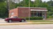 <b>Enoree - 29335 - </b>Just off to the right is the official vehicle of rural South Carolina, a mid-80's multi-hued Ford F150 pickup truck with rust highlights. It's unshaved owner was inside the truck reading his mail, a cigarette, with 2 inches of ash, dangling from his mouth. (09/01/07) Enoree - 29335