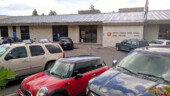 <em>Bend</em> - Middle of the week and midday is a busy time at the main Bend P.O., so much so that we had to wait on a parking spot. Fortunately from the one I got I could capture car and sign in the same photo. (07/06/22)