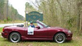 I have to be honest, I have "photoshopped" this image. It wasn't until we got home and looked at our pictures on the computer monitor that my noticed I was holding the Motoring Challenge Guide against the door of the car using just my middle finger. So I copied the tip of that finger and pasted so as to appear that I was using two fingers to hold the Guide. (3/22/14) City - Yemassee