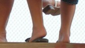 <b>Feet - </b>Here is last night's photo. While walking to and from the concession stand I noticed that you could see everybody's feet from the back of the stands. (06/26/2003) Feet