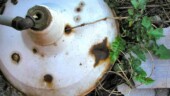 <b>Discarded - </b>A discarded old light fixture found behind an abandoned warehouse in Augusta, Georgia. This picture came from a series of images I took for last week's Photo Friday's challenge of "Neglect." I choose a different image for that challenge and just yesterday, I discarded all the images I didn't want to keep, including this one. (03/30/2004) Discarded