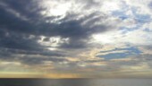 <b>Morning - </b>The sun has risen above the horizon of the Atlantic Ocean, but was immediately hidden behind some low clouds. Facing in the exact opposite direction from Hodge Podge. (01/17/04) Morning
