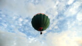 <b>Floating Away - </b>This balloon showed up, unlaoded, filled with air and took off while others were stil waiting around for who knows what. (09/21/08) Floating Away