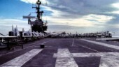 <b>Structure - </b>Taken on the bow of the U.S.S. Midway while in port. The planes are arranged on the flight deck in a very structured manner. While in port the front of the flight deck is kept clear so helicopters can use it for various supply missions. While at sea during flight ops there are a couple of other parking plans used before launches and after landings. 80 planes need to be kept arranged on 4 acres of deck in a manner similar to one of those slide games where there is one open square. Some planes are moved into one area to clear a place for different planes and so on. (As a theme bonus, the part of the ship sticking up on the left there is called the Island or super structure.) Structure