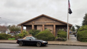 <em>Yamhill</em> - There was a guy pressure washing the lot on the left and the one on the right would leave the car mostly hidden, so I pulled up in front, on the wrong side of the street. (3/23/25)