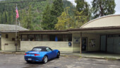 <em>Westfir</em> - The Post Office is the flat roof part and, this is just a guess, the round roof is the community center, but there was no way to tell because the only signage is the ELCOME above the double doors. (3/29/25)