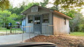<b>Scotia - 29939 - </b>This cute little building is about a block and a half away from the railroad tracks. I wonder if it was moved to this location after they built the highway and the trains became less important. (08/18/07) Scotia - 29939