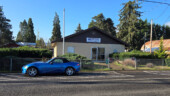 <em>Dexter</em> - The only legal parking for this post office was behind that hedge right behind the Miata which would have made seeing the car impossible. (3/29/25)