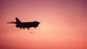 <b>Orange Sky - </b>Here is the "Whale" silhouetted against the evening sky. I only have the one shot of this event, so I have to assume I didn't have the motor winder on the camera. Also because I don't have any other planes taken against this sky I can't be sure I took this on the U.S.S. Midway. Might have been during practice touch and go's on Guam. Orange-Sky