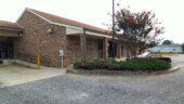 <b>Dalzell - 29040 - </b>The crepe myrtle looks nice out front of this Post Office, but it blocked me from taking a picture head on that would have showed the lettering with the town name and zip. (08/05/07) Dalzell - 29040