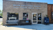 <em>Mount Vernon</em> There was no good spot to park the car to get it directly into the photo, but if you look to the left of the "blue box," you'll see its reflection. I did this once before for Midland over 5 years and 275 post offices ago. (9/2/25)