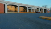 <b>Rock Hill - 29730 - </b>An empty parking lot and the sunrise reflected in the Post Office front windows. Doesn't get any better than that. (12/02/07) Rock Hill - 29730