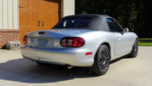 Miata is Always the Answer - The previous owner's personalized tag. He offered to let me keep it, but I didn't really want to. The Answer