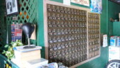<b>Hilda - 29812-5756 - </b>After 2 failed attempts to find the Post Office in the very small town of Hilda I had given up. My wife suggested write the Postmaster of the missing zip to ask for directions and include a SASE. I thought it was fools errand, but boy was I wrong. This week I got a letter back explaining that the PO was inside a car repair garage. There were no outward signs of what it was is why we missed it before. We went over on a Saturday morning when the place was open and this is what we found. Because we couldn't get the real car in the picture, if you look towards the bottom of the photo, right next to a fuel filter, is the Matchbox Garnet Red Miata. (08/25/07) Hilda - 29812-5756