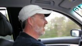 <b>Whoooosh - </b>If you look past the good looking gentleman behind the wheel you will see the scenery blurring by outside the window. At the next to the last traffic signal before turning the car back in I decided to punch it and see what would happen. Triple digit speed in about the time it would take the Miata to get 45 MPH is what. (03/28/06) Whoooosh