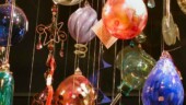 <b>Glass - </b>Shot this evening as Donna and I wandered through downtown Aiken. This is from the display window of a place called "The Artist's Parlor." They sell art on consignment. If the owner likes your stuff she will try and sell it in her store. She must be going through a glass phase as both front windows contained a lot of baubles and beads made from the substance. (03/02/2004) OLYMPUS DIGITAL CAMERA