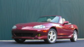 <b>December - </b>I'm always scouting interesting backdrops for possible Miata shoots. I was really intrigued by this green wall. The asphalt surface was raised up, so I could get this low perspective without crawling on my belly. It had some small pines growing along the base at intervals that I "airbrushed" out because they were distracting. December