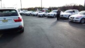 <b>End of the Day - </b>The whole fleet is parked in the dealer' lot at the end of the day waiting for the ferry drivers. And that would be us. Sally and I volunteered to drive a couple of the vehicles to Arlington for the event there tomorrow. (04/09/07 - Sterling, VA) End of the Day