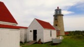 <b>Monhegan Lighthouse</b> - From the hill the lighthouse resides on you can watch the sunrise over the ocean to the east and in the evening to the west see the sun set over the ocean. (09/06/12) Monhegan Lighthouse