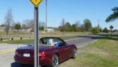 If you look past the car and squint real hard you might be able to read the second sign further down the road. It's there in case you didn't understand Dead End, it reads, No Outlet. (3/8/14) Destination - Dead End