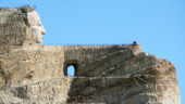 <b>Crazy Horse Close Up - </b>You can't really get too close to the mountain. Note at the bottom the yellow things, those are large pieces of rock moving equipment. (04/13/09) Crazy Horse Close Up