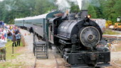 <b>All Aboard - </b>The crowd moves forward in anticipation of boarding the train. All Aboard
