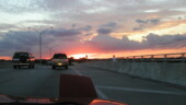 <b>One Headlight - </b>Riding back the Donna's sister's house with a pizza on my lap as she drives her Miata. (11/28/03) One-Headlight