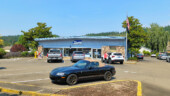<em>Sutherlin</em> - It was a Monday so I expected a few cars or people in some shots, but I was going to let this woman get in her car and then retake the shot. Unfortunately, right then, a big ol' pickup up truck with a camper shell parked right next to me. You could hardly so the building anymore. (8/25/25)