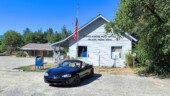 <em>Williams</em> - Offstage left is a local in a pickup who stopped to ask me if I wanted him to take my picture with my car. I said no thanks and told him what I was doing, and he thought it sounded like a fun adventure. (9/21/25)