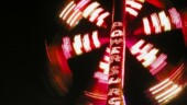 <b>Power - </b>A picture of the POWERSURGE ride at the Western Carolina Fair. There was supposed to be fireworks Wednesday night at 9:30, so Donna and I parked across the street to wait. I set up the tripod and snapped a couple images while we waited. And waited, and waited. Finally gave up about 9:50 and packed it in. When we got home about 15 minutes later, I could swear I heard the distance thuds of fireworks. Carnival workers don't wear watches I guess. (10/24/2003) Power