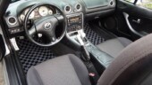 <b>Checkered Mats</b> - These mats were the final touch to brightening up the formerly all black interior. Checkered Mats