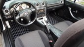 <b>Checkered Mats</b> - These mats were the final touch to brightening up the formerly all black interior. Checkered Mats