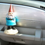 <b>Gnorm and a PT Cruiser - </b> The Chrysler PT Cruiser is the official car of the Gnomes. (05/25/07) Gnorm-and-a-PT-Cruiser