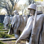 <b>Korean War Memorial I - </b>This would have been so much more emotional if the ground these fellows were walking over was snow covered, but it was cold enough already to feel like winter in April. (04/10/2007) Korean War Memorial I