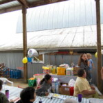 <b>Baby Shower 2 - </b>Looking to the left. Along with grilled hot dogs and hamburgers, guests treated to a pot luck lunch that included everything from soup to nuts. (09/30/06) Baby Shower 2