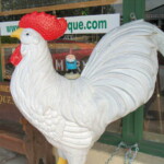<b>Gnorm and the Chained Up Giant Rooster - </b> Of course roosters don't sweat, so Gnorm could ride them, but this one was chained up so he couldn't get very far. (05/26/07) Gnorm-and-the-Chained-Up-Giant-Rooster