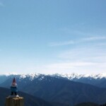 <b>Gnorm and Hurricane Ridge - </b> Hurricane Ridge in the Olympic Gnational Park is well worth the 18 mile drive one way, but don't forget your little blue coat because it gets chilly up there. (05/31/07) Gnorm-and-Hurricane-Ridge