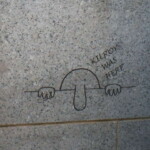 <b>Kilroy Was Here - </b>Was Kilroy a shipyard inspector whose chalked inspection signature inspired many a G.I. in WWII? We will never know for sure, but in tribute to that ubiquitous grafitti of the Second World War, it was engraved in a panel on the back side of the memorial. (04/10/2007) Kilroy Was Here