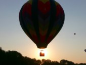 <b>Sunrise - </b> Our late comer is last off the ground, but not that far behind. (09/09/07) Sunrise