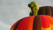 <b>Peek-a-Boo - </b>The dragon balloon peeks its head above one that has yet to launch. (09/21/08) Peek-a-Boo
