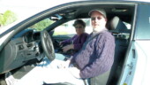 <b>Strapped In - </b>The fellow put us in our first car of the day offered to take our picture once we got loaded up. Not wanting to hurt his feelings, we let him, even though I was ready to go - now. Note the big fat steering wheel... (03/35/08) Strapped In