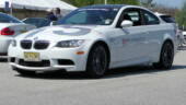 <b>M3 Coupe - </b>414HP V-8. Yikes! This car should be illegal, but I'm glad it is not. Just the exhaust note alone is enough to make the hairs on your arm stand up. Not deep throaty Detroit rumble, but raspy, race car purposeful. One suggestion, when you mash the go pedal to the floor you should already have your head back on the headrest or it will be snapped back to it. This is as close as you can get to experiencing a catapult launch from the flight deck of an aircraft carrier on land, unless you drag race funny cars on the weekend. This is not us in the car, but the couple that drove it after us. (03/35/08) M3 Coupe