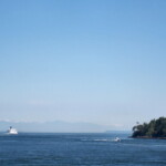 <b>Ferry To Victoria - </b>Halfway between Tsawwassen (Vancouver) and Swartz Bay (Vancouver Island) while passing between the San Juan Islands, we pass our sister ferry headed in the opposite direction. (05/30/07) Ferry To Victoria