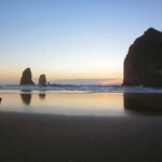<b>Photographing Haystack 1 - </b>One of my favorite quirks in photography is to snap pictures of other people taking photographs and even though it is off-season I am not alone on the beach with a camera. (10/01/06) Photographing Haystack 1