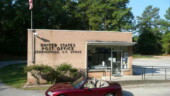 <b>Jenkinsville - 29065 - </b>Like the angle I got with the photo because the building is in a depression off the main road. Love the lettering on the side of the PO because he raised metal letters always leave interesting shadows. (09/09/07) Jenkinsville - 29065