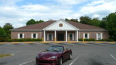 <b>Mullins - 29574-9997 - </b>This building looks like it started life as a bank or doctor's office before it became a Post Office. (04/19/08) Mullins - 29574-9997