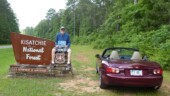 You can always tell when you are miles from nowhere when the signs have bullet holes in them, but this is the first time I've seen one of these wooden National Forest signs perforated by small projectiles. (5/17/14) National Forest - Kisatchie