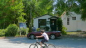 <b>Pinopolis - 29469 - </b>Third in a series of bicycle riders and Post Offices (see Pamplico & West Columbia.) I already had a perfectly good shot of this Po, but Donna spotted this kid coming up the street so we waited for him. (04/20/08) Pinopolis - 29469